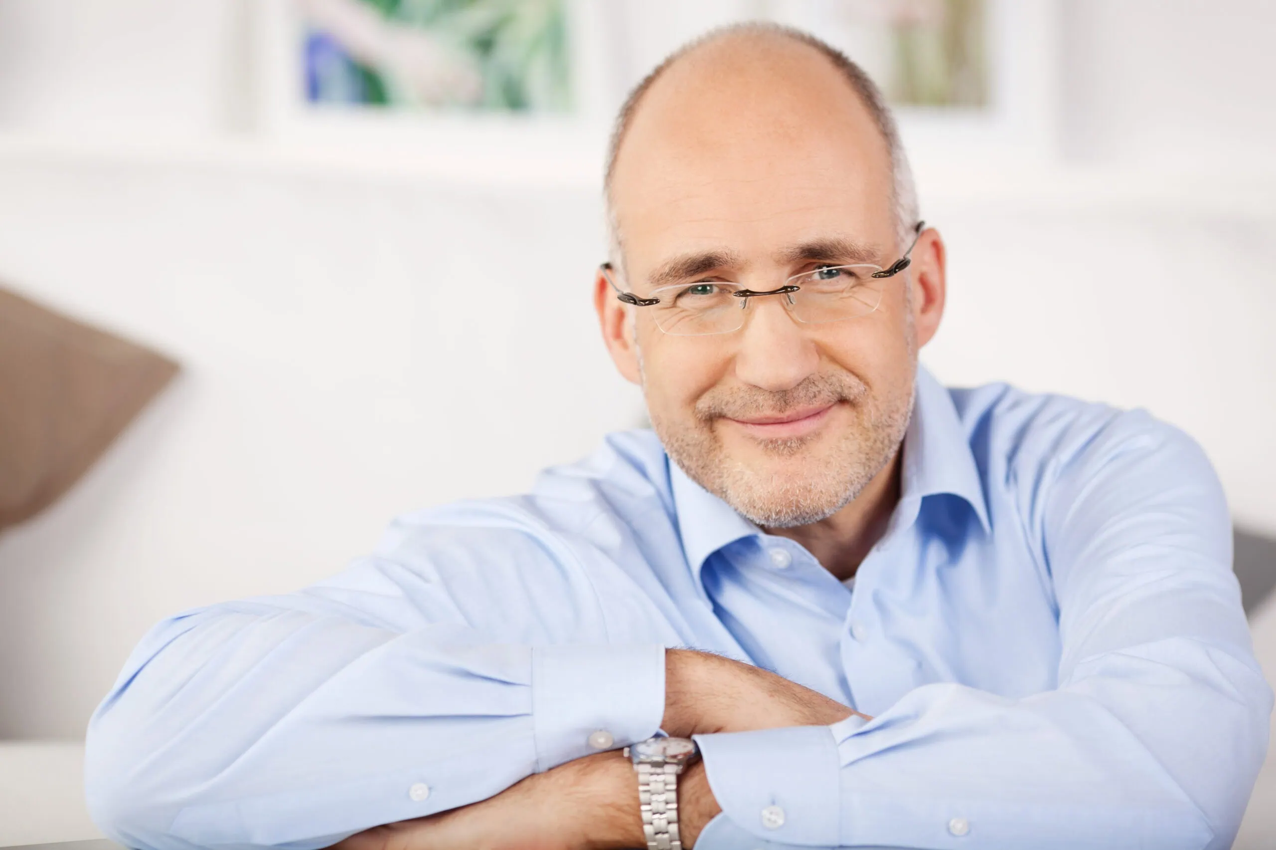 Close,portrait,of,smiling,man,relaxing,at,home